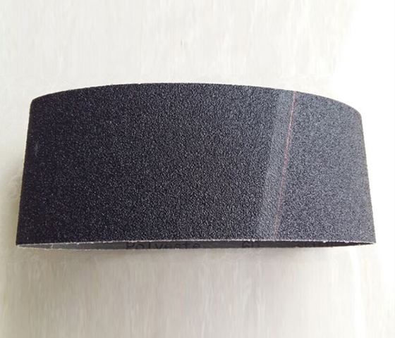 Abrasive sanding belt